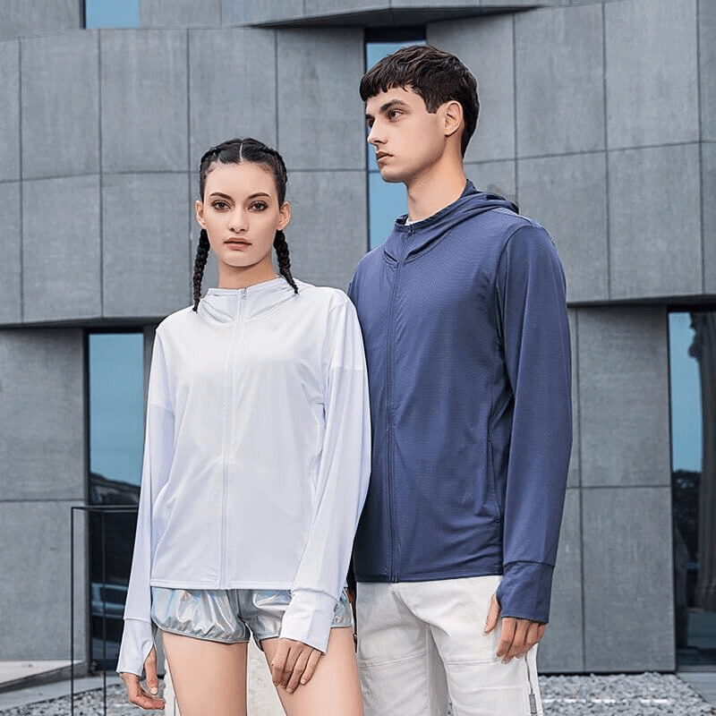 Outdoor enthusiasts wearing breathable sports windbreakers for women and men, perfect for trekking and hiking.